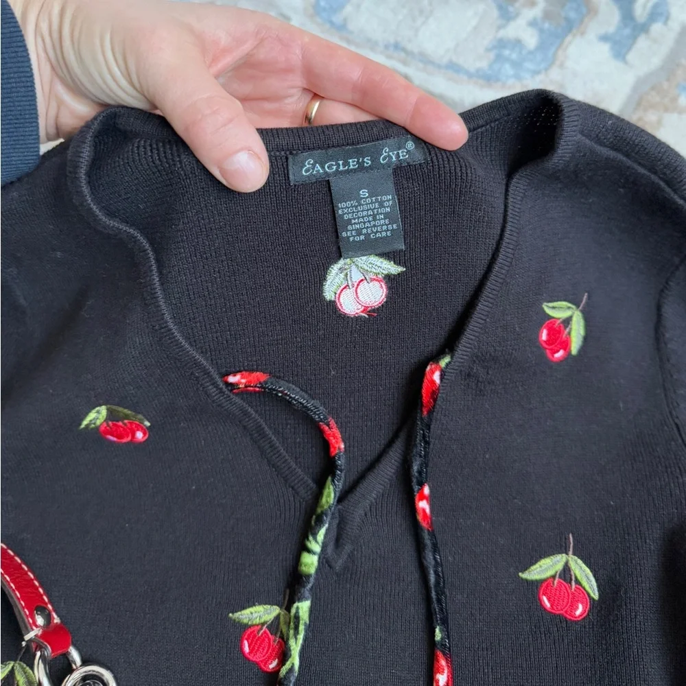 Black long sleeve Y2K vibes top with red cherries and a tie front detail size S